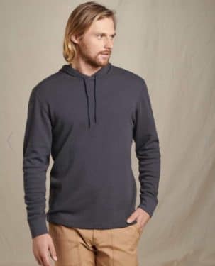 Framer dos hoodie on man in tan pants - hoodie is grey