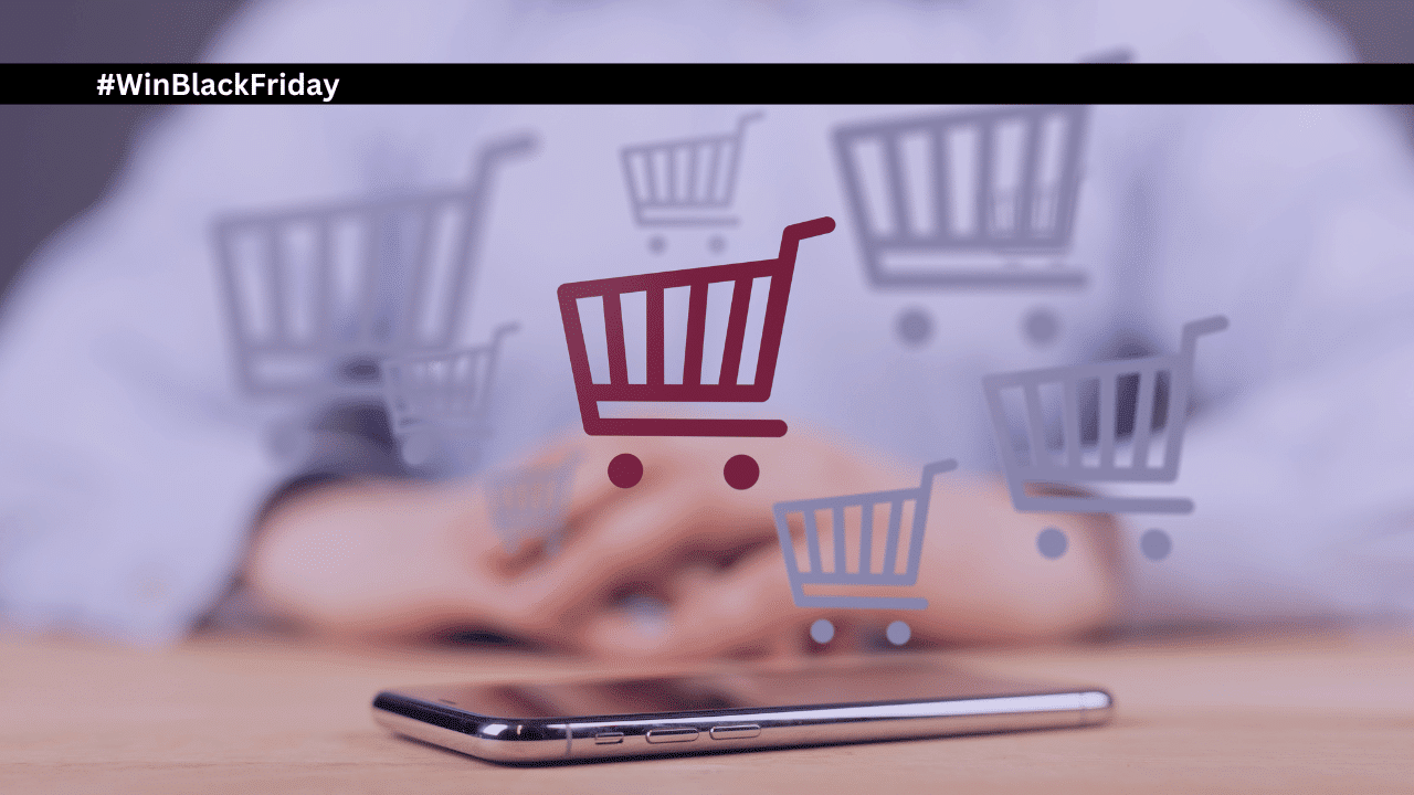 shopping carts and an iphone man sitting at table #WinBlackFriday in the top left corner